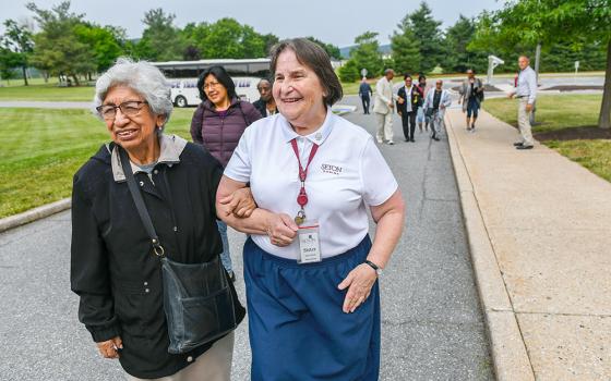 Daughter of Charity Sr. Anne Marie Lamoureux, right, welcomes guests at the National Shrine of St. Elizabeth Ann Seton in Emmitsburg, Maryland. A dream of Lamoureux’s grew into Seeds of Hope, a program that offers retreats to those marginalized by society. (Courtesy of the National Shrine of St. Elizabeth Ann Seton)