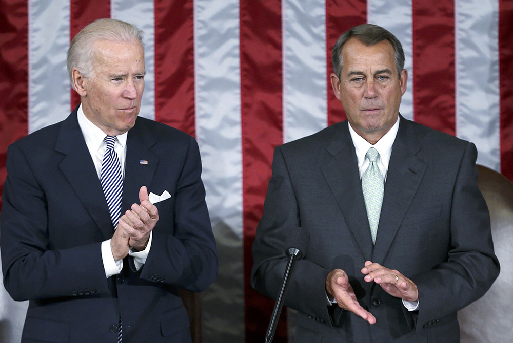 Then-Vice President Joe Biden and then-House Speaker John Boehner are pictured in 2013 during a joint meeting of Congress. (CNS/Reuters/Gary Cameron) 