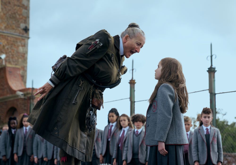 "Roald Dahl's Matilda the Musical" stars Emma Thompson as Agatha Trunchbull, a tyrannical principal, and Alisha Weir as student Matilda Wormwood. (Dan Smith/Netflix © 2022)