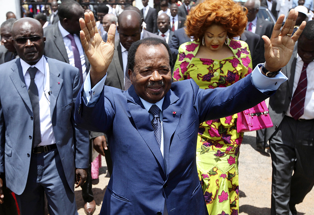 In this Oct 9, 2011, file photo, Cameroon President Paul Biya waves after casting his vote during the presidential elections in Yaounde, Cameroon. (AP photo/Sunday Alamba, File)