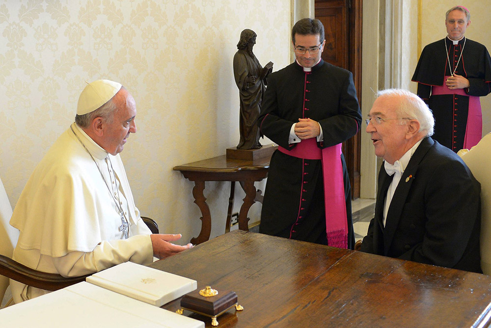 Pope Francis talks with Ken Hackett, then U.S. ambassador to the Holy See, during a meeting at the Vatican Oct. 21, 2013. (CNS/L'Osservatore Romano)