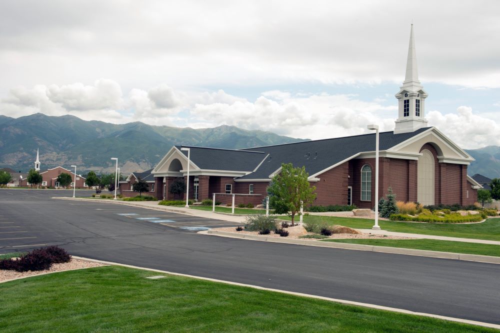 This Thursday, Aug. 21, 2014, photo shows two LDS chapels built adjacent to each other on Angel Street, in Kaysville, Utah.