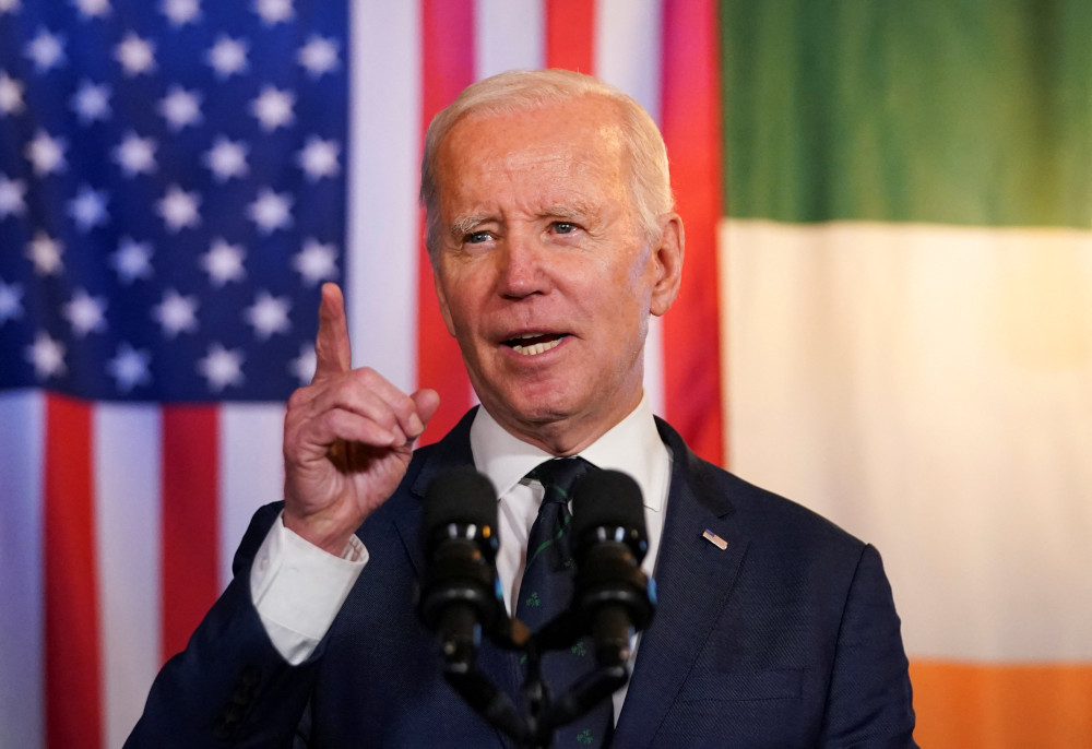 U.S. President Joe Biden speaks in a pub in Dundalk, Ireland, April 12, 2023, during his visit to mark the 25th anniversary commemorations of the "Good Friday Agreement." (OSV News photo/Kevin Lamarque, Reuters)