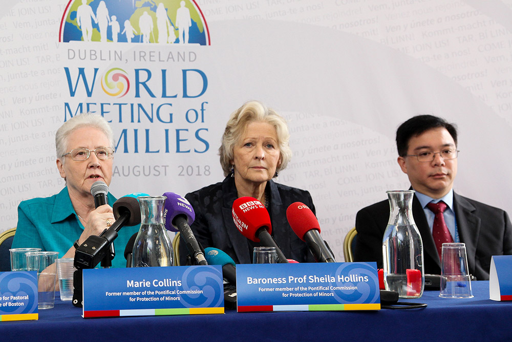 Marie Collins, Baroness Sheila Hollins and Gabriel Dy-Liacco are seen at a news conference at the World Meeting of Families Aug. 24, 2018. (CNS/Courtesy World Meeting of Families/John McElroy)