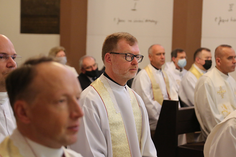 Jesuit Fr. Hans Zollner, center, then a member of the Pontifical Commission for the Protection of Minors, is seen at a conference of church representatives and child protection experts in Warsaw, Poland, Sept. 20, 2021. (CNS/Courtesy of EpiskopatNews)