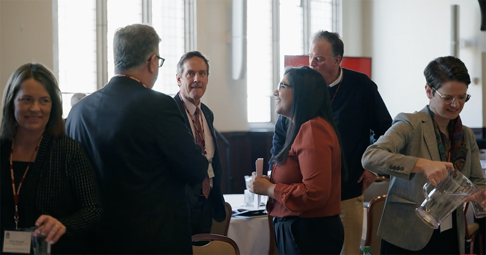 Participants are seen conversing in the video on the conference "The Way Forward: Pope Francis, Vatican II, and Synodality," held at Boston College March 3-4. (NCR screenshot/YouTube/Center on Religion and Culture)