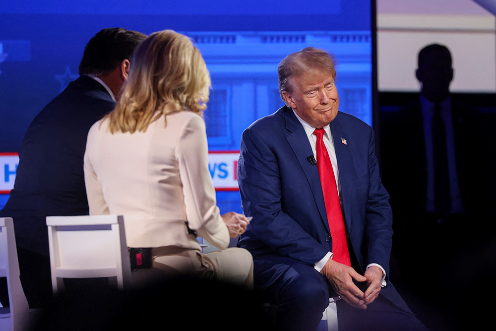 Republican presidential candidate and former President Donald Trump participates in a Fox News Channel town hall ahead of the caucus vote in Des Moines, Iowa, Jan. 10. (OSV News/Reuters/Scott Morgan)