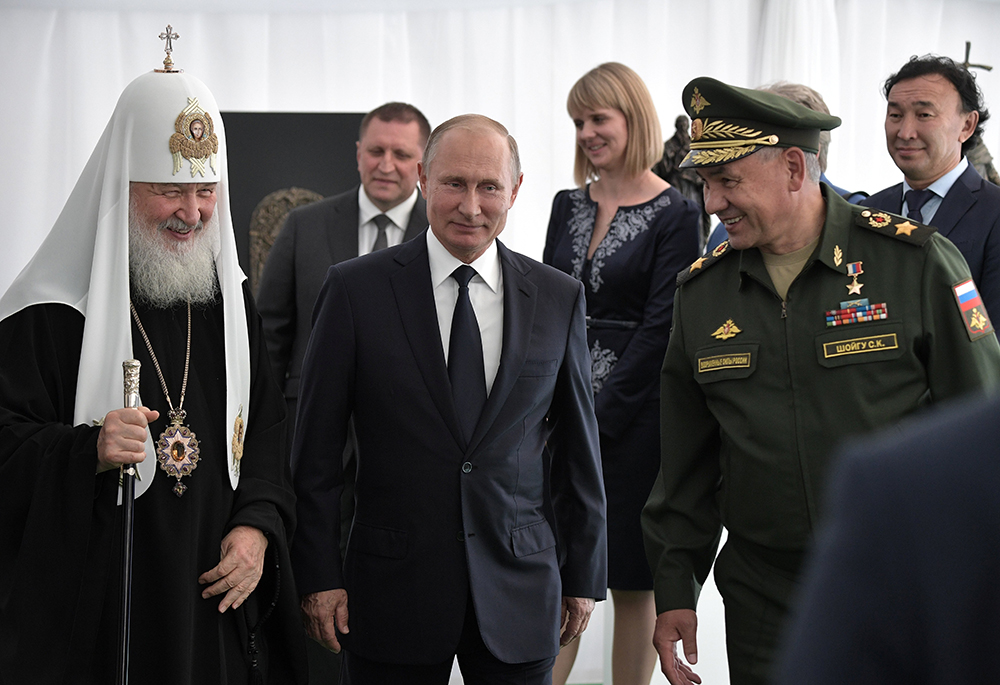 Russian Orthodox Patriarch Kirill of Moscow President Vladimir Putin, and Defense Minister Sergei Shoigu, are pictured in a 2018 photo. (OSV News/Sputnik/Alexei Nikolsky/Kremlin via Reuters)