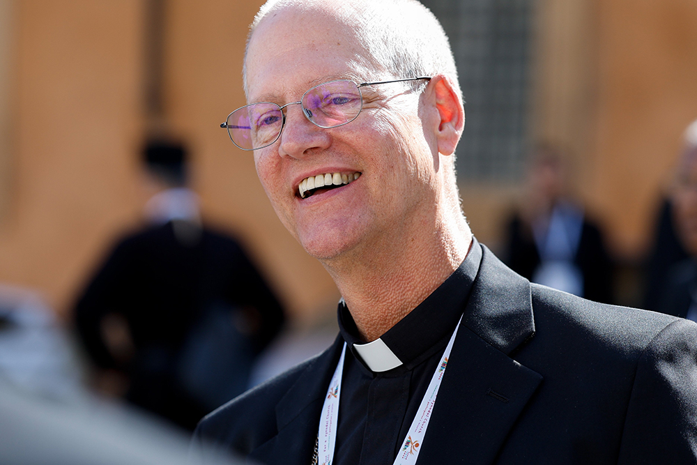 Archbishop Paul Etienne of Seattle leaves the Vatican's Paul VI Audience Hall Oct. 6, 2023, after a morning session of the assembly of the Synod of Bishops. (CNS/Lola Gomez)