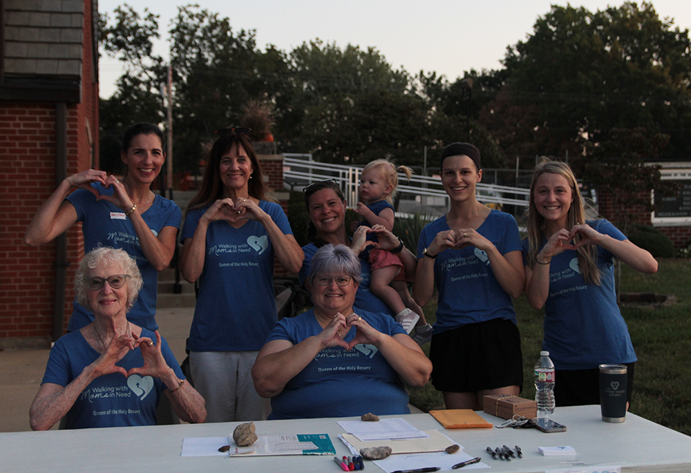 Volunteers from the Walking with Moms in Need group at Queen of the Holy Rosary Parish in Overland Park, Kansas, at an awareness walk in October 2023. (Katie O'Hara)