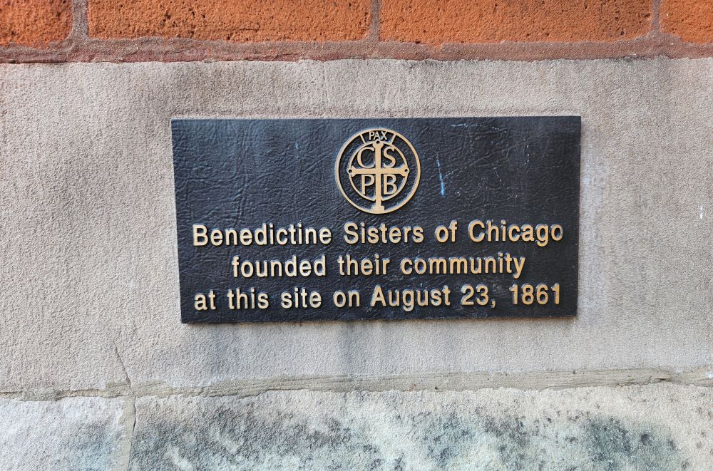 A plaque on a building in downtown Chicago commemorates the establishment of the Benedictine Sisters of Chicago in 1861.