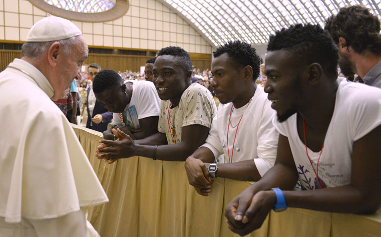 Pope Francis meets a group of Nigerian refugees at the Vatican Aug. 12. (CNS/Reuters/L’Osservatore Romano)