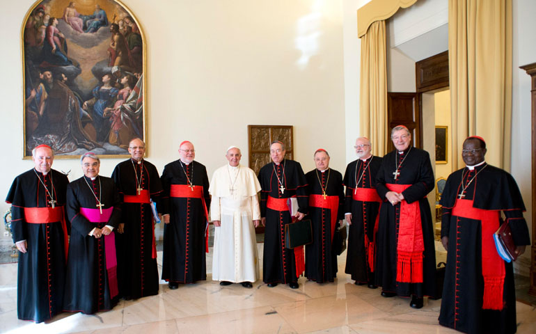 The advisory Council of Cardinals, along with the council's bishop-secretary, meets with Pope Francis at the Vatican Oct. 1. (CNS/Reuters/L'Osservatore Romano)