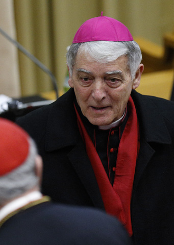 Cardinal-designate Edoardo Menichelli of Ancona-Osimo, Italy, arrives for a meeting with cardinals and cardinals-designate in the synod hall at the Vatican Feb. 12. The pope, cardinals and cardinals-designate were meeting for two days to discuss the reform of the Roman Curia in advance of a Feb. 14 consistory. The pope will create 20 new cardinals at the consistory. (CNS photo/Paul Haring)