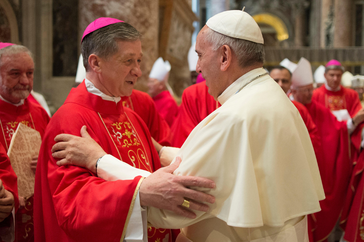 Pope Francis greets Archbishop Blase Cupich of Chicago after a Mass marking the feast of Sts. Peter and Paul in St. Peter's Basilica at the Vatican June 29. (CNS photo/Paul Haring)