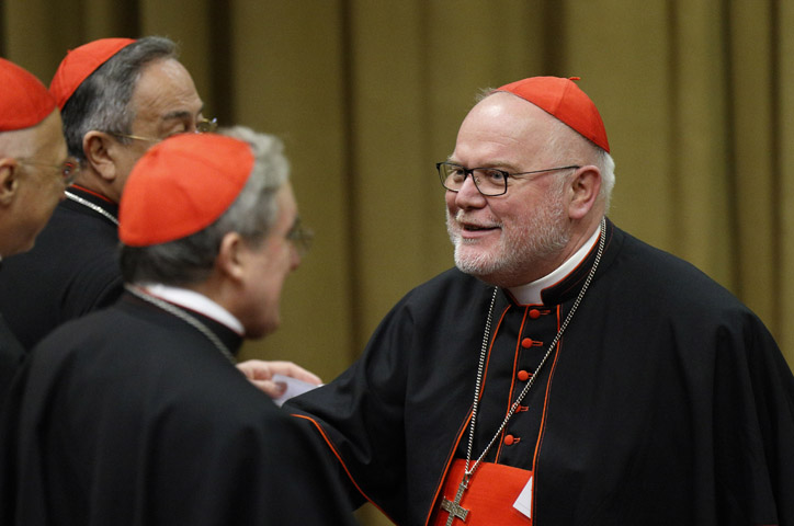Cardinal Reinhard Marx of Munich-Freising, president of the German bishops' conference, arrives for a session of the Synod of Bishops on the family at the Vatican Oct. 23. (CNS/Paul Haring)