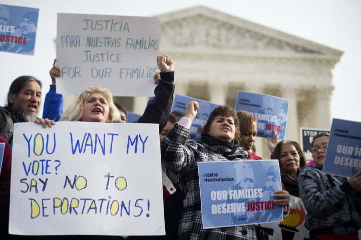 Immigration advocates rally outside the U.S. Supreme Court Jan. 15 in Washington. (CNS/Michael Reynolds, EPA)