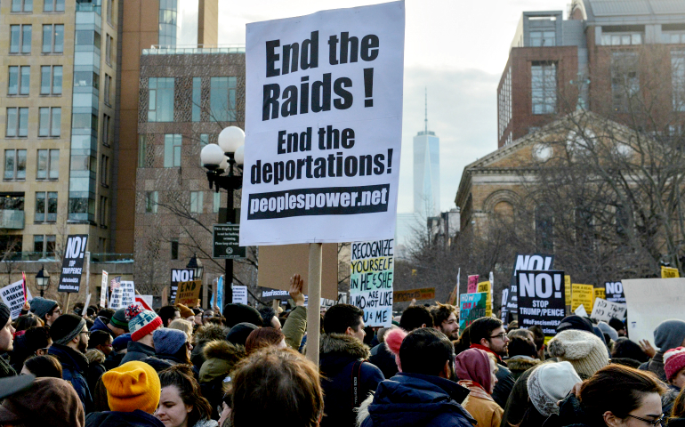 People join a Feb. 11 protest against President Donald Trump's immigration policy and Immigration and Customs Enforcement raids in New York City. (CNS/Reuters/Stephanie Keith)