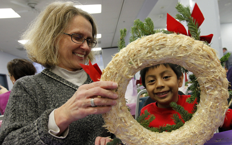 A mother and son make an Advent wreath at St. Joseph Parish in Libertyville, Ill., in 2010. (CNS/Catholic New World/Karen Callaway)