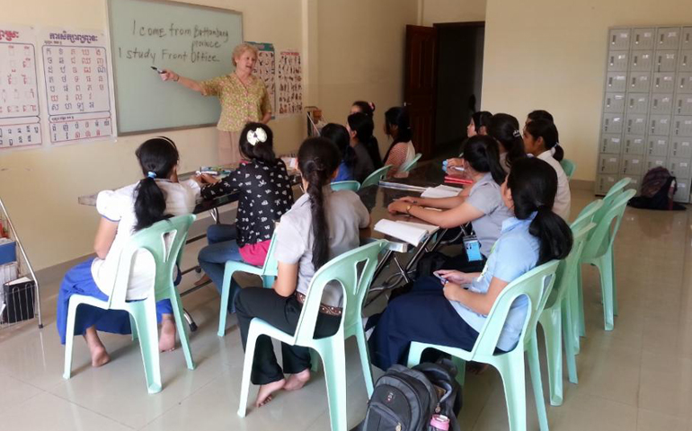 Sr. Helene O'Sullivan teaches English to Cambodian girls at Horizons Vocational Training Institute (Courtesy of Sr. Helene O'Sullivan) 