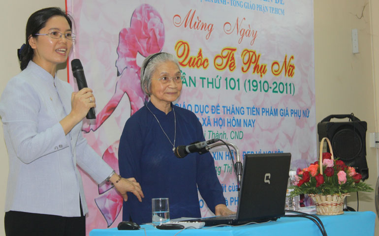 Sr. Mai Thanh, right, was a key speaker at a seminar on women's empowerment, marking International Women's Day in 2011. (Teresa Hoang Yen)