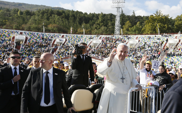Pope Francis greets the crowd before celebrating Mass at Mikheil Meskhi Stadium in Tbilisi, Georgia, Oct. 1. (CNS photo/Paul Haring)