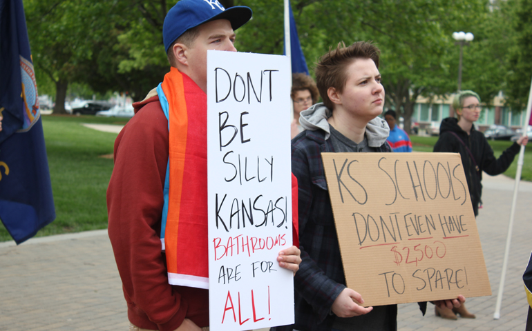 Protesters rally April 29 in Topeka, Kan., against bills that would require students in public schools to use bathrooms according to their gender at birth. (NCR/Traci Badalucco)