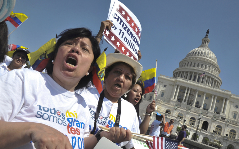 Maria del Alba Rodriguez and her sister, Rosa Maria Villalba, shout slogans as people rally for comprehensive immigration reform April 10 near the U.S. Capitol in Washington. (CNS/El Pregonero/Rafael Crisostomo)