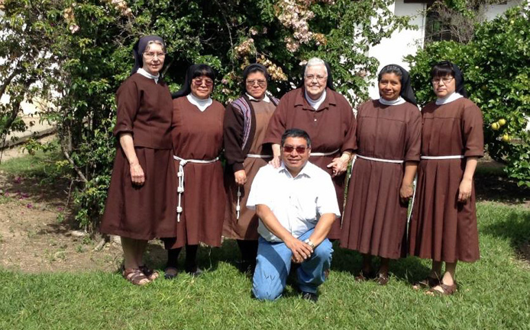 The Poor Clares community poses with Padre Francisco Boche at the monastery of Our Lady of Wisdom of the Virgin of Guadalupe; standing in the back row are Srs. Agnes Stretz, Maria Concepción Menjívar, Sandra Morales, Mary Peter Rowland, Ana Maria Mateo Juan and Elizabeth Menjívar. (Courtesy of Sr. Agnes Stretz)