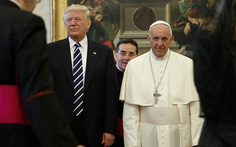 President Trump stands next to Pope Francis during a private audience at the Vatican on May 24, 2017. (Courtesy of Reuters/Evan Vucci/Pool)