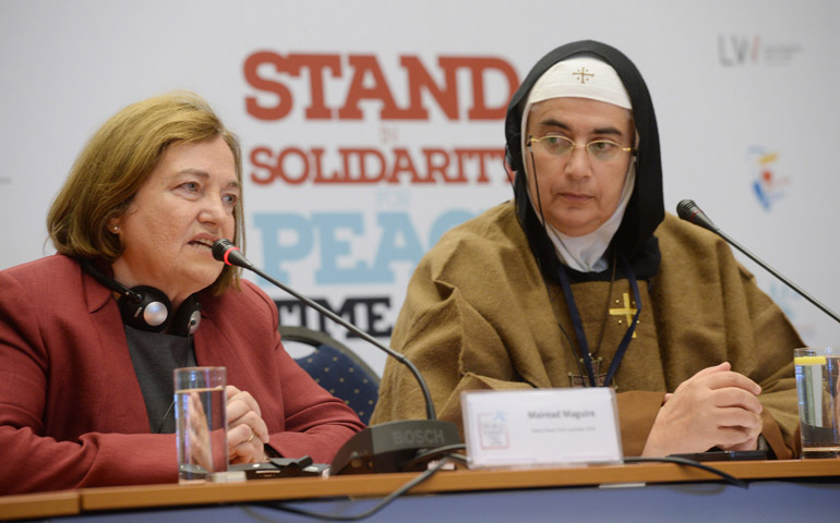 Mother Agnes Mariam, right, and Nobel Peace Prize laureate Mairead Maguire speak at a press conference Oct. 22 at the 13th World Summit of Nobel Peace Laureates in Warsaw, Poland. (EPA/Jacek Turczyk)