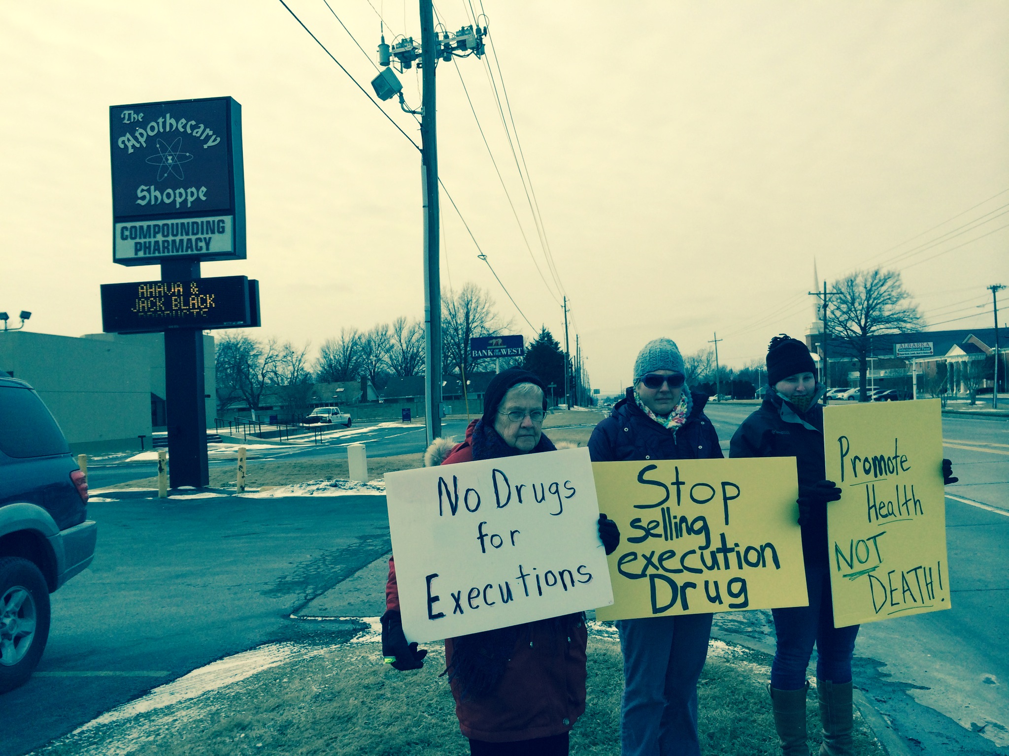 Theresa Maly, Laura Blasi and Susie Roling protest before Tulsa compounding pharmacy