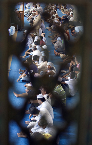 Muslims take part in the first Friday prayers of the holy month of Ramadan in Rome’s mosque on Sept. 5, 2008. (Reuters/Chris Helgren)
