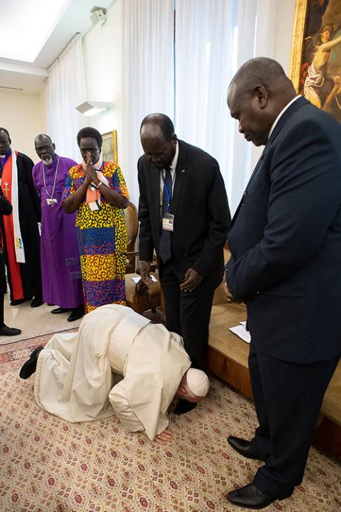 Pope Francis kisses the feet of South Sudan President Salva Kiir April 11, 2019, at the conclusion of a two-day retreat at the Vatican for African nation's political leaders. (CNS/Vatican Media via Reuters)
