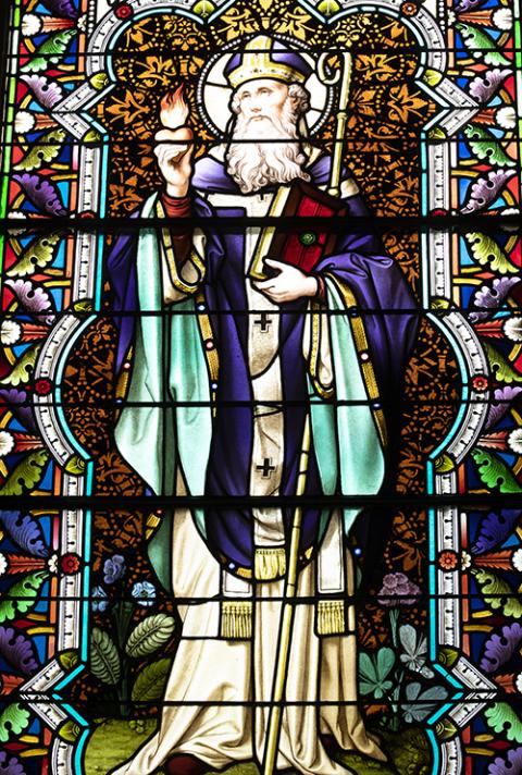 A likeness of St. Augustine is seen in stained glass at Caldwell Chapel on the campus of The Catholic University of America May 25, 2021, in Washington. (CNS/Tyler Orsburn)
