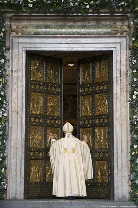 Pope Francis opens the Holy Door of St. Peter's Basilica to inaugurate the Jubilee Year of Mercy Dec. 8, 2015, at the Vatican. (CNS/Vatican Media)