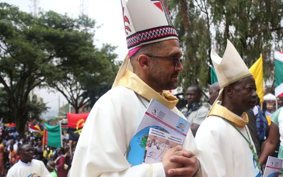Bishop Sithembele Sipuka of Mthatha, South Africa, (left) is shown here at the opening Mass of the weeklong meeting of the Symposium of Episcopal Conferences of Africa and Madagascar in Kampala, Uganda, July 21, 2019. (CNS/Courtesy of SECAM)