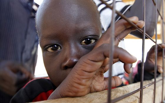 A child from South Sudan is pictured in a 2012 photo at a registration center in the Kakuma refugee camp in northern Kenya. Catholic bishops in Kenya are urging the government to shelve plans to close two refugee camps that host refugees who fled civil wa