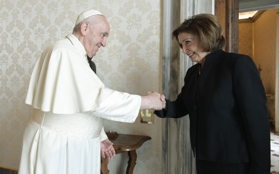 Pope Francis greets U.S. House Speaker Nancy Pelosi, D-Calif., during a private audience at the Vatican Oct. 9, 2021. (CNS/Vatican Media)