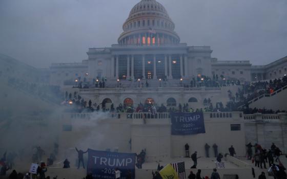 Insurrectionists with Trump 2020 banners swarm the U.S. Capitol 