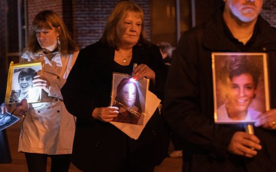 Supporters of SNAP, Survivors Network of those Abused by Priests, walk in memory of alleged abuse victims outside the 2018 assembly of the U.S. bishops in Baltimore. (CNS photo/Kevin J. Parks, Catholic Review)