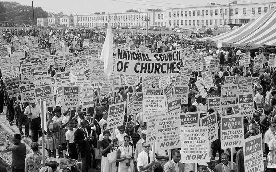A banner for the National Council of Churches is seen among hundreds of signs carried by participants in the March on Washington for Jobs and Freedom Aug. 28, 1963. The march speakers included several religious leaders, including the Rev. Dr. Martin Luther King, who was a Baptist minister, and Archbishop Patrick O'Boyle of Washington, who offered the invocation. (OSV News/Courtesy of Library of Congress)