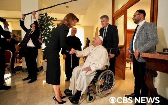 Pope Francis greets Norah O'Donnell before an exclusive interview with the "CBS Evening News" anchor April 24 at the Vatican, for an interview ahead of the Vatican's inaugural World Children's Day. (OSV News/Courtesy of CBS NEWS)