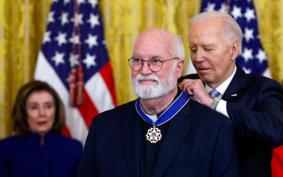 U.S. President Joe Biden presents the Presidential Medal of Freedom to Jesuit Fr. Greg Boyle during a ceremony at the White House in Washington May 3.