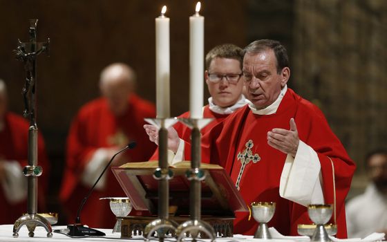 Archbishop Dennis Schnurr of Cincinnati concelebrates Mass with other U.S. bishops from Ohio and Michigan at the Basilica of St. Paul Outside the Walls in Rome Dec. 11, 2019. The bishops were making their "ad limina" visits to the Vatican. (CNS)