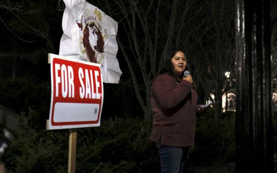 Audrey Kang, a Boston College student, speaks at a rally that was organized Nov. 14 by Climate Justice for Boston College and other campus groups against the college administration's acceptance of Koch Foundation funding. (RNS/Aysha Khan)