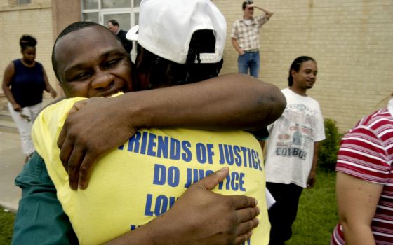 James Barrow hugs a well-wisher as he leaves Swisher County Courthouse in Tulia, Texas, in June 2003 after being released from prison pending appeal on charges in connection with a July 1999 drug bust.