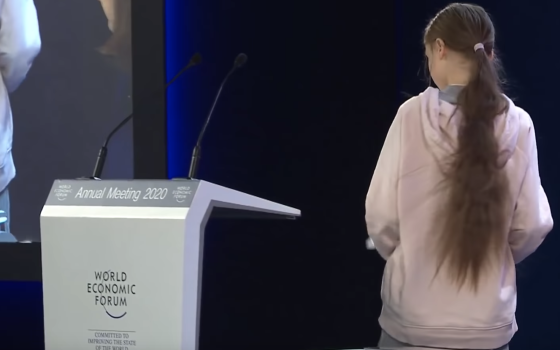 Greta Thunberg takes the stage at the World Economic Forum meeting in Davos, Switzerland (screengrab from WEF upload to YouTube)