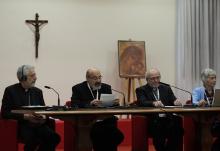 Fr. Tomas Halik, second from left, speaks at a meeting of parish priests as part of the ongoing process for the Synod of Bishops April 29 at Sacrofano, outside of Rome. Other speakers at the table, from left, are: Bishop Luis Marín de San Martín, synod undersecretary; Canadian Fr. Gilles Routhier; and María Lía Zervino, sociologist and former president of the World Union of Catholic Women's Organizations. (CNS/Courtesy of the Synod of Bishops)