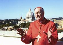 New Cardinal Theodore McCarrick addresses the media on the roof of the North American College in Rome following a consistory ceremony at the Vatican Feb. 21, 2001. McCarrick was among 44 new cardinals created by Pope John Paul II. (CNS/Carol Zimmermann)